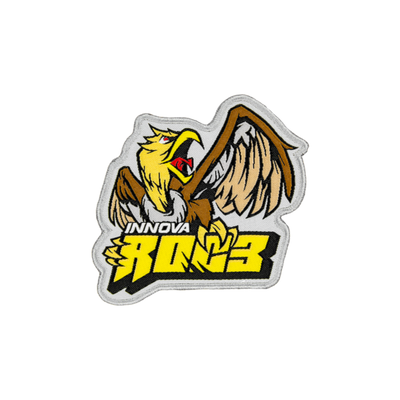 A patch is shown that says "Innova" in white and "Roc3" in blocky yellow lettering with a brown and yellow bird sitting on top of the lettering.